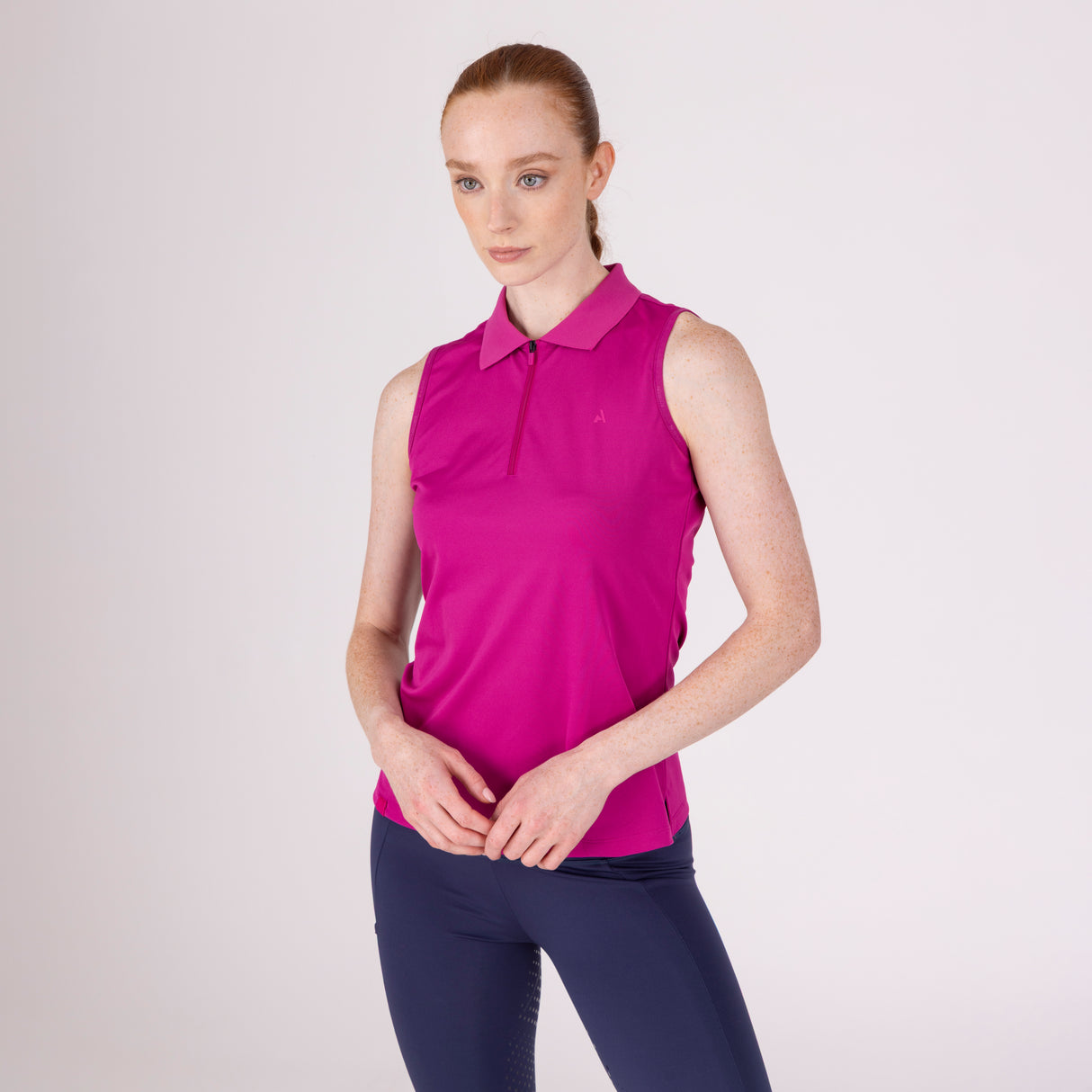 Shires Aubrion Ladies React Sleeveless Tech Polo #colour_fuchsia