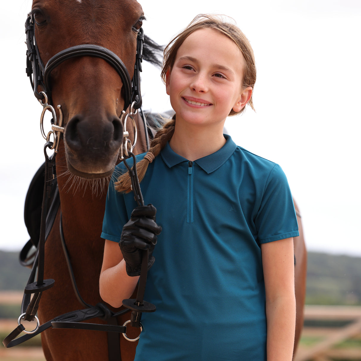 Shires Aubrion Young Rider React Tech Polo #colour_kingfisher