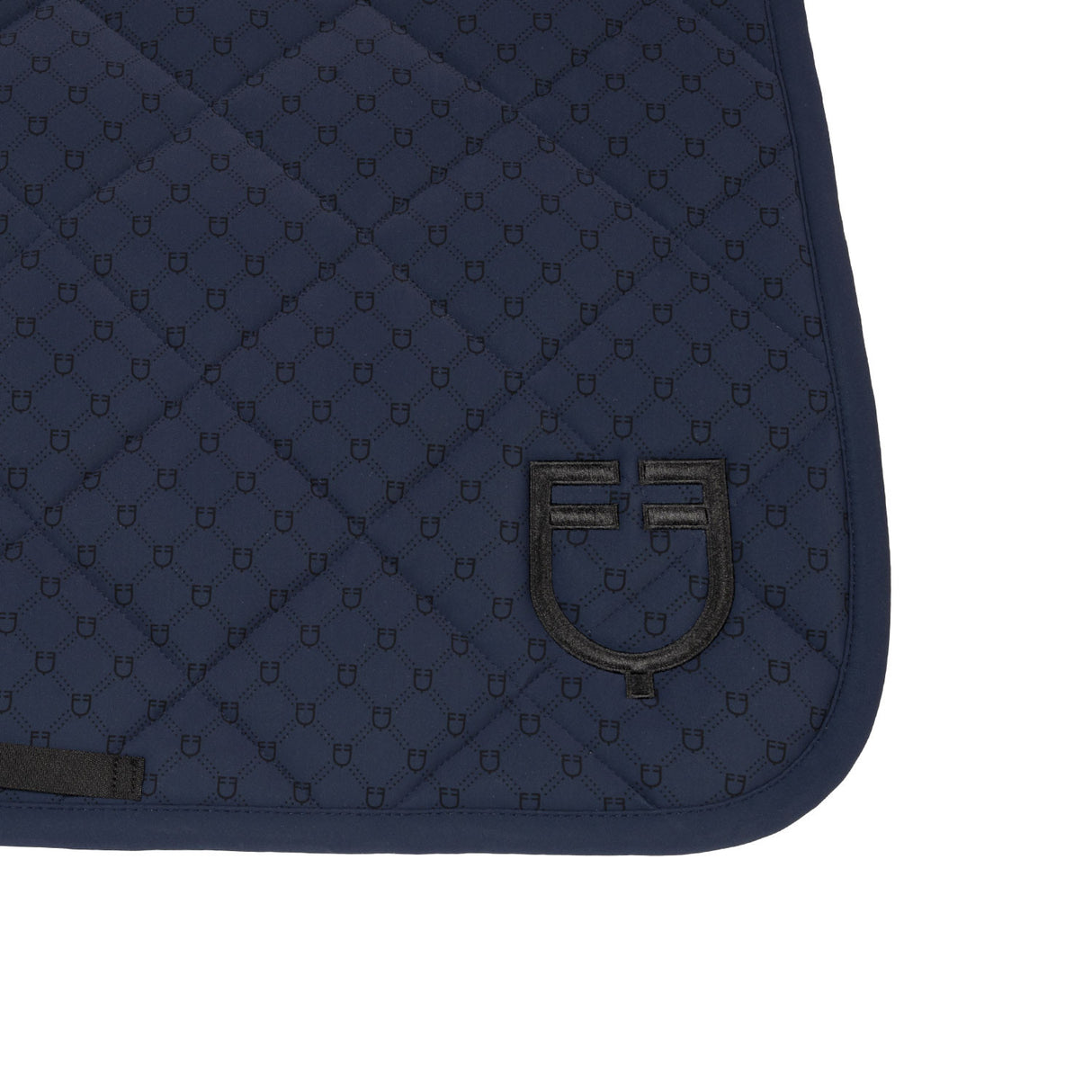 Jumping saddle pad with monogram print