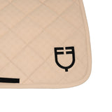 Jumping saddle pad with monogram print