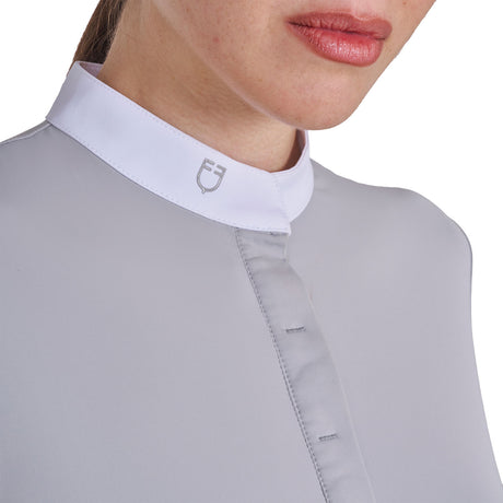 Women's competition polo shirt with concealed button closure