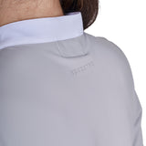 Women's competition polo shirt with concealed button closure