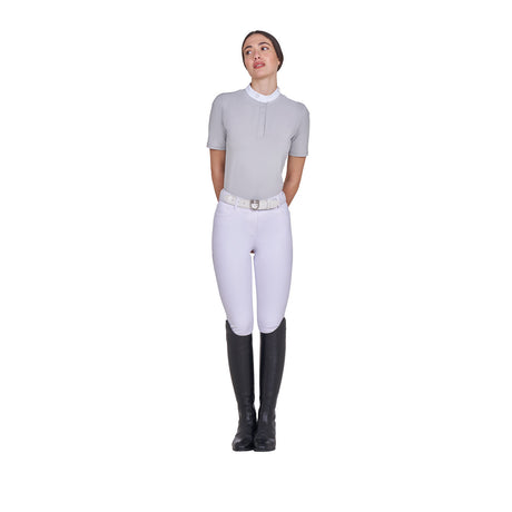 Women's competition polo shirt with concealed button closure