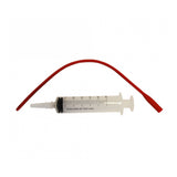 Faisseur de colostrum nettex avec seringue et tube en latex orange