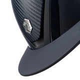 Charles Owen Hyda Carbon riding hat in Navy Matte/Navy Gloss, angled close-up of the carbon-effect top and peak